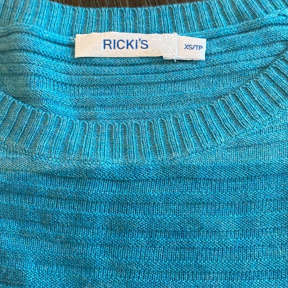 Ricki’s teal blue light sweater in size extra small. - Picture 3 of 9